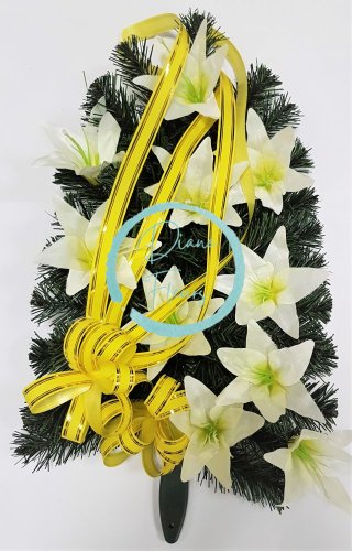 Künstliche Trauerkranz 46cm x 35cm mit Lilien und Trauerband in Zellophan Gelb