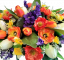 A beautiful sympathy arrangement in the shape of a heart made of artificial Tulips, Poppies, Anemone, Lavender and Accessories 67cm x 40cm x 30cm