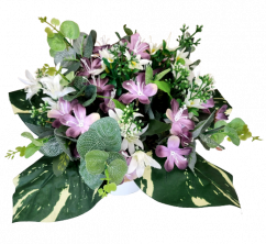Variation of artificial flowers in a pot 35cm x 24cm purple, green, cream