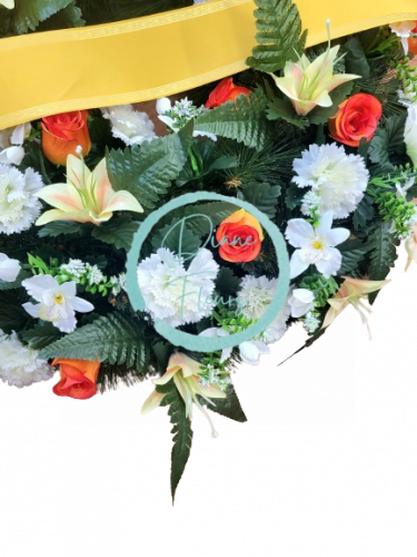 Artificial pine wreath decorated with Roses, Carnations, Lilies and accessories 75cm
